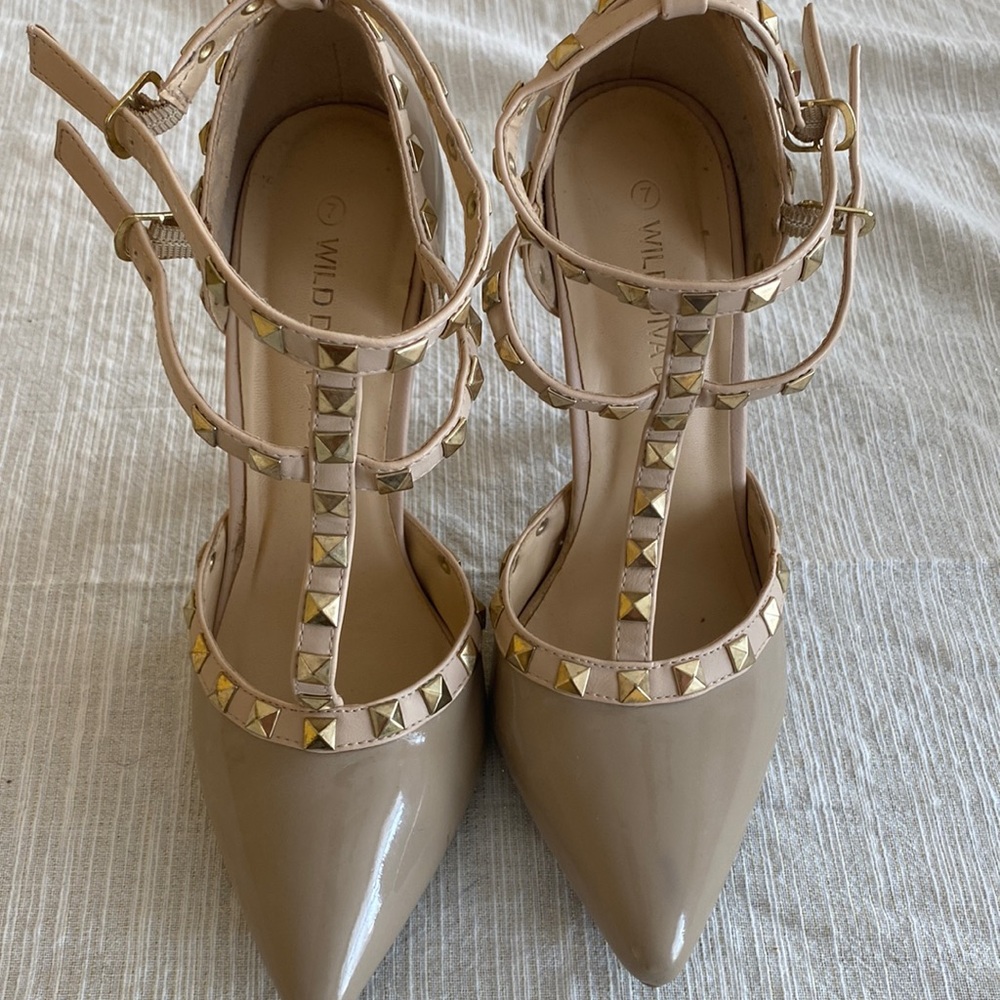 Tan heels with rhinestones.